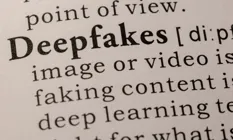 Close-up of a dictionary entry defining 'Deepfakes' with detailed explanation about manipulated images and videos.